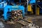 Grodno, Belarus - October 2018: XTPack medium sized full automatic baler at work for compressing waste OCC, plastic film