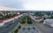 Grodno Regional Drama Theater and Holy Cross Church And Traffic In Mostowaja And Kirova Streets in the morning light