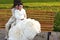 Groom and bride on the bench