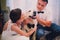 Groom and bride playing with their dog labrador at home