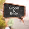 Groom and Bride word concept on speech bubbles from wood on blur background