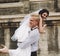 Groom carries bride in his arms