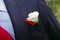 Groom in elegant suit with boutonniere