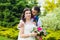 Groom hugs the bride`s shoulder