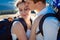 Groom kisses his charming bride close up. Alpine mountains on background