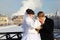 Groom kissing bride hand at winter outdoors