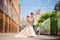 The groom met the bride. Loving wedding couple in the summer on the square in the city of Dnipro, Ukraine. The concept of romantic