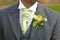 Groom with orchid buttonhole at wedding