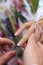 Groom puts on to the bride a gold ring