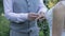 Groom puts the wedding ring on Bride`s finger. Closeup of bride and groom exchanging wedding rings. Marriage, hands with