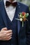 Groom`s boutonniere on the jacket.