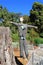 Groom scarecrow in suit in garden at fall