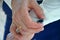 The groom straightens cufflinks on his shirt. Fees groom, Wedding and honeymoon in the tropics on the island of Sri Lanka.