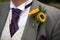 Groom with sunflower buttonhole