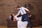 Groom trying to choke bride in white dress