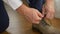 Groom tying his shoes