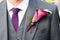 Groom wearing a lily buttonhole