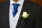 Groom with wedding buttonhole flower