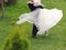 Groom Whirling Bride