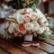 Grooms accessories luxurious bouquet, gold rings, cufflinks on wooden floor