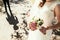 Grooms shadow nearly bride with wedding bouquet