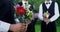 Groomsmen holding flower bouquet 4K 4k