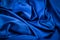 Grooved blue fabric background