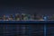 Groovy San Diego skyline at night with light trails over water