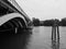 Grosvenor Bridge over river Thames in London, black and white