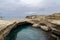 Grotta della Poesia coast cliff, Salento, Apulia, Italy