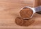 Ground Allspice on a Wooden Table