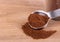 Ground Cloves on a Wooden Table