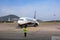 Ground crew airport marshaller in Alghero, Italy