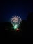 Ground fireworks against night sky