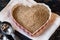 Ground Flaxseed in a Heart Shaped Bowl