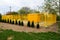 ground with tanks for liquefied gas. Modern gas installation with protective fencing. Yellow fence. Supply of gas to