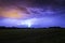 Ground to cloud GC lightning flash against a dramatic storm sky