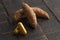 Ground Turmeric Capsules form on a Wooden Table