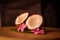 Grounded coconut flakes,half coconut with green leaves wooden on background,hd footage of coconut milk and half coconut on wooden