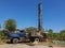 A groundwater drill rig is preparing to drill