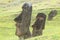 Group of Abandoned Massive Moai statues on Rano Raraku volcano, the historic Moai quarry on Easter Island of Chile