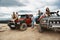 Group of active young people travelling on their off road cars