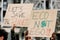 Group of activist people holding placards and banners for climate change