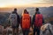 Group of Adventurous Hikers Trekking Through Majestic Mountain Landscape with Backpacks