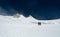 Group of alpinists on a glacier.