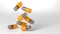 A group of antibiotic pill orang capsules falling. Healthcare and medical 3D illustration background