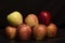 Group of Apple isolated on black background