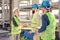 Group of architects or business partners shaking hands on a construction site