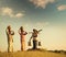 Group Asian Burmese traditional farmers in sunset