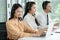 Group of Asian employee work in telemarketing customer service teams. Young operator woman working with headset smiling